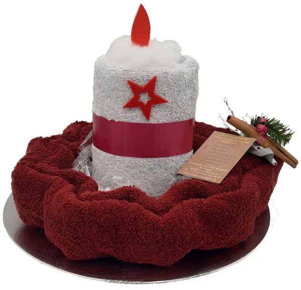 Frotteebox Geschenk Set Kerze grau in dunkelrotem Stern geformt aus 2x Handtuch auf Deko Teller